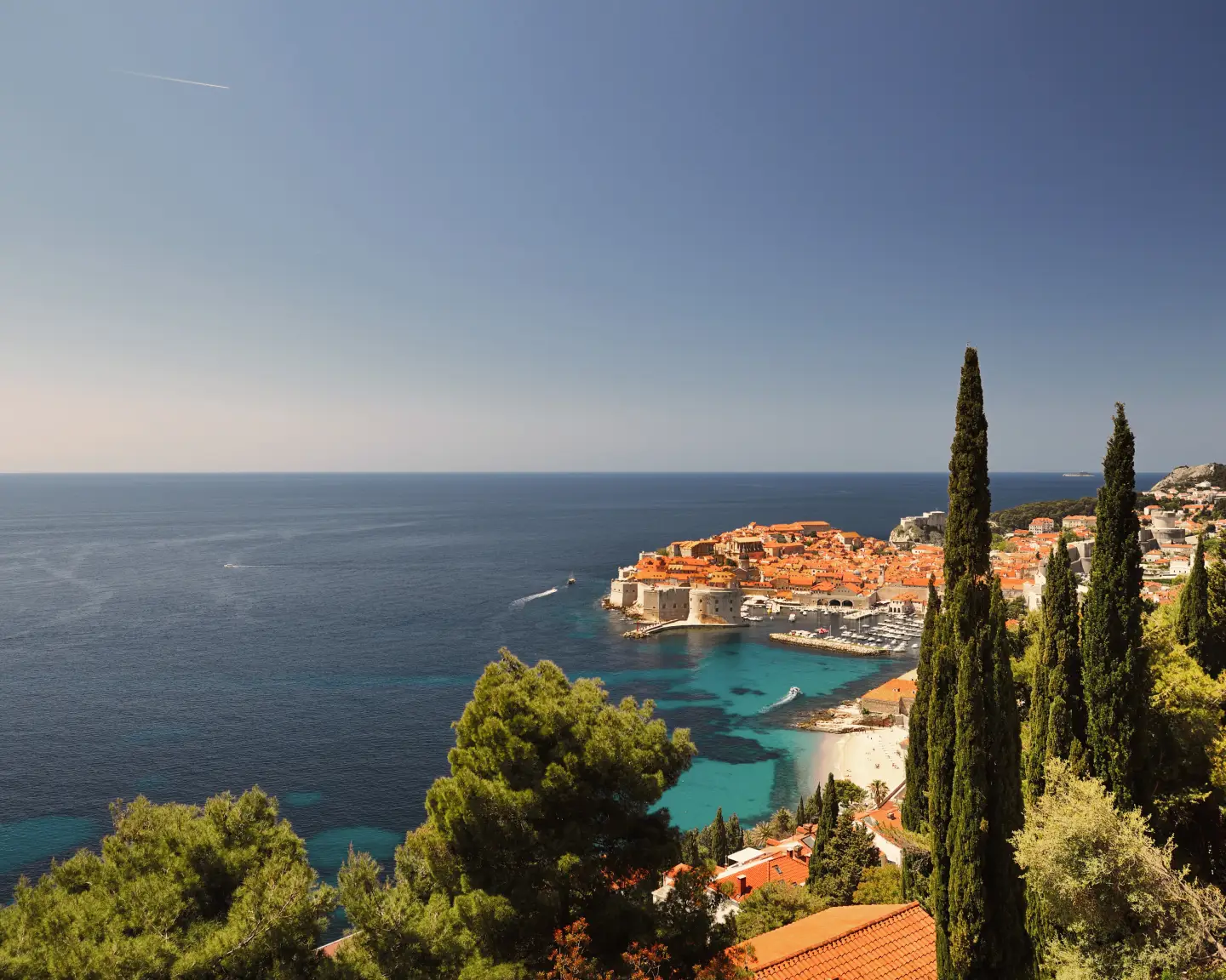 Panoramic view of Dubrovnik's old town and the Adriatic Sea on a sunny day