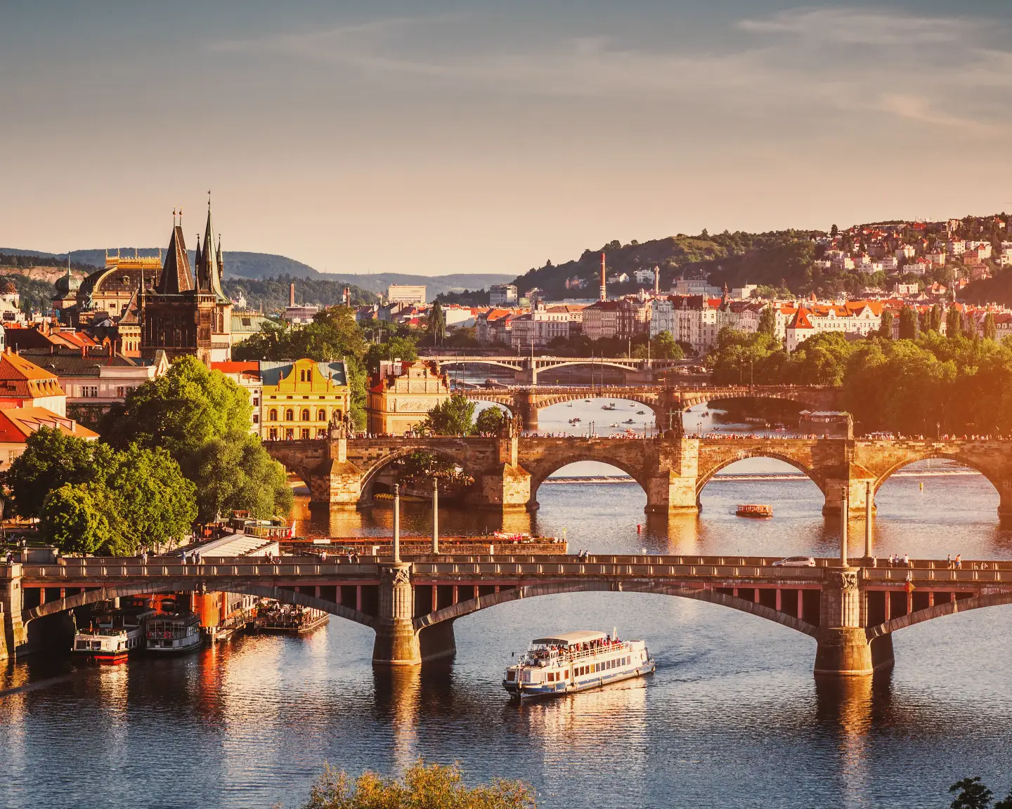 Aerial view of the Old Town Pier and Charles Bridge over the Vltava River in Prague, Czechia